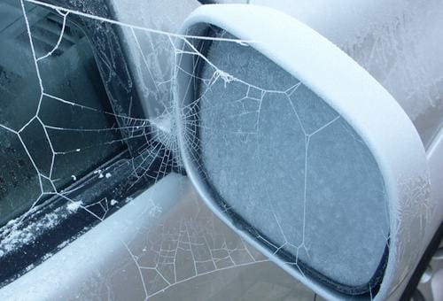 spider-web-on-car-mirror
